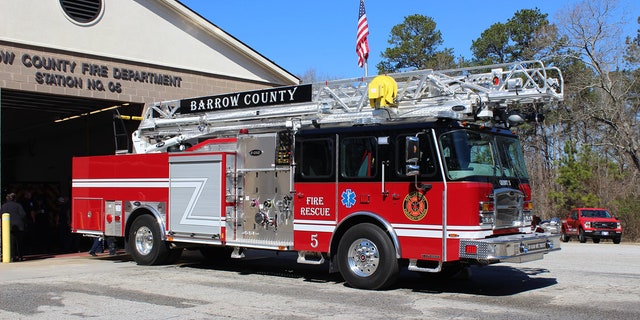 Firefighters fought the flames and found three people dead inside the home, officials said.