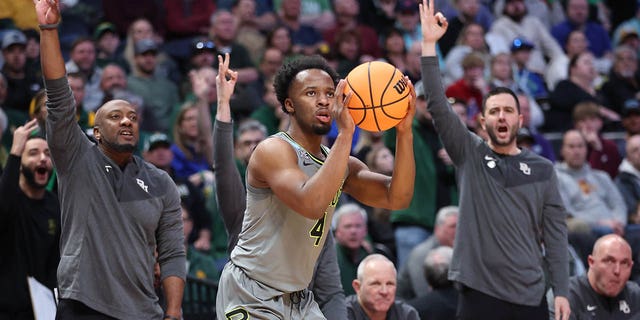 LJ Cryer, #4 of the Baylor Bears, attempts a three-point basket during the second half against the UC Santa Barbara Gauchos in the first round of the NCAA Men's Basketball Tournament at Ball Arena on March 17, 2023, in Denver, Colorado.