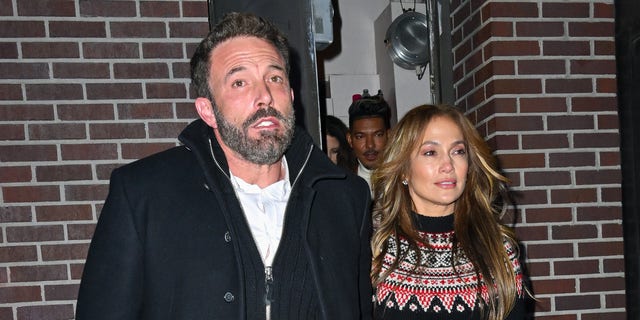 Ben Affleck and Jennifer Lopez are caught by cameras as they leave a Broadway show.