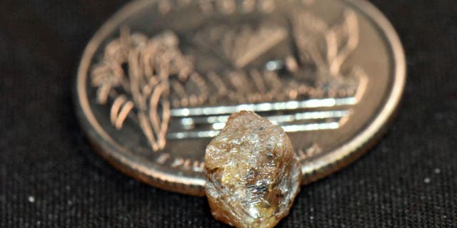 Lucky Arkansas man finds 3.29-carat brown diamond at state park 3 Anderson originally thought the brown diamond was quartz until inspecting it closer.