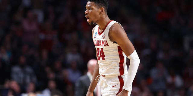 Brandon Miller #24 of the Alabama Crimson Tide reacts during the first half against the Maryland Terrapins in the second round of the NCAA Men's Basketball Tournament at Legacy Arena at the BJCC on March 18, 2023, in Birmingham, Alabama. 