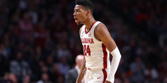 Brandon Miller #24 of the Alabama Crimson Tide reacts during the first half against the Maryland Terrapins in the second round of the NCAA Men's Basketball Tournament at Legacy Arena at BJCC on March 18, 2023 in Birmingham, Alabama. 