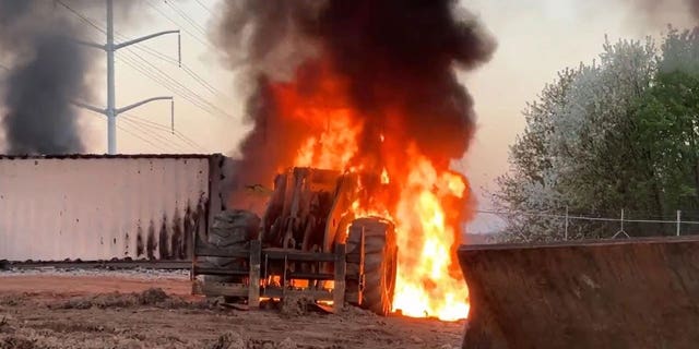 A bulldozer caught fire on Sunday at the future Atlanta Public Safety Training Facility.