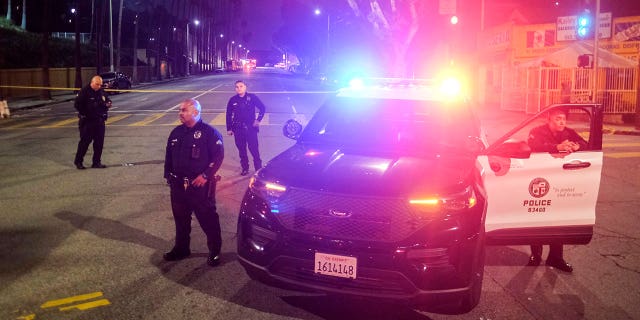 Suspect who injured 3 Los Angeles officers kills himself during standoff 2 Police officers stand guard near a crime scene where three Los Angeles police officers were shot on March 8, 2023, in Los Angeles, California. The 32-year-old suspect committed suicide during the standoff with the police Tuesday.