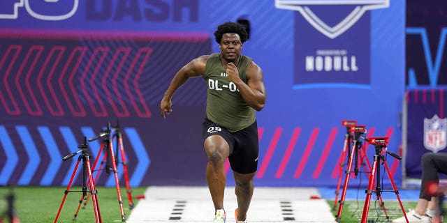 Defensive lineman Calijah Kancey of Pittsburgh participates in the 40-yard dash during the NFL Combine at Lucas Oil Stadium March 2, 2023, in Indianapolis. 