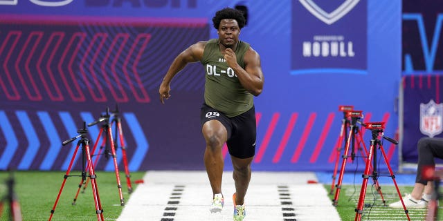 Defensive lineman Calijah Kancey of Pittsburgh participates in the 40-yard dash during the NFL Combine at Lucas Oil Stadium March 2, 2023, in Indianapolis.
