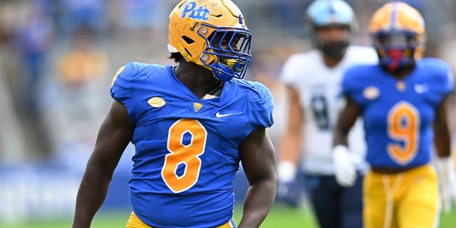 Calijah Kancey (8) of the Pittsburgh Panthers reacts after sacking Kasim Hill of the Rhode Island Rams during the fourth quarter at Acrisure Stadium Sept. 24, 2022, in Pittsburgh.