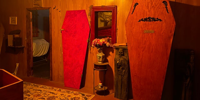 'Haunted' Texas home filled with caskets and skeletons listed for sale at $125K 5 The casket doors serve as an entry way to extra storage space in the home.
