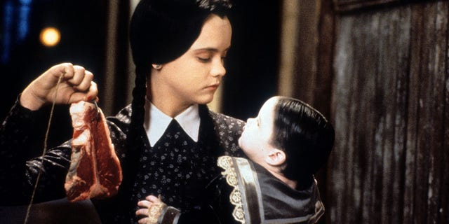 Christina Ricci has said her home life as a child was "chaotic" and that she preferred to be on set where she felt "valued."