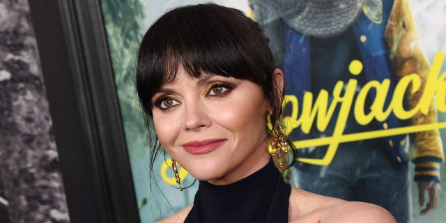 Christina Ricci said kid stardom was her escape from a "horrendous" childhood.