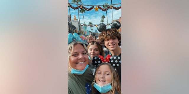 Tiffany Eckert (left) and her kids, Berkley Poturalski, 12 (front), Myles Eckert, 18 (right) and Marlee Eckert, 19 (back), during a trip to Disney World in 2021.