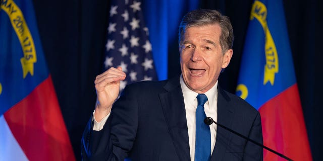 North Carolina Gov. Roy Cooper speaks on May 17, 2022, in Raleigh, North Carolina. Cooper issued an executive order designed to encourage more people to apply for state jobs even if they do not have a college degree.