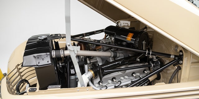 The Cord's engine is a 289 cubic-inch eight-cylinder.