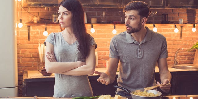 angry couple in kitchen