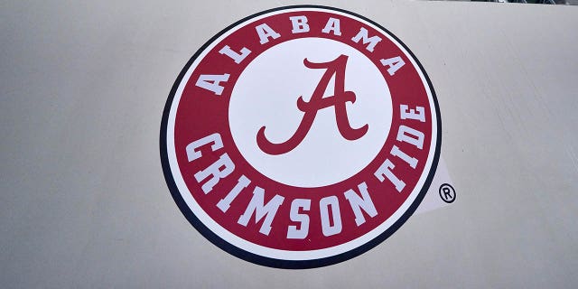 A detail view of the Alabama Crimson Tide logo is seen on a wall during the CFP Semifinal Goodyear Cotton Bowl game between the Cincinnati Bearcats and the Alabama Crimson Tide on December 31, 2021, at AT&amp;T Stadium in Arlington, TX. 