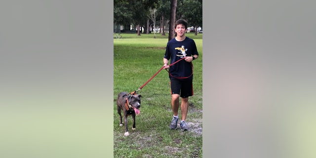 The boys cross-country team motto is "Gentleman. Scholar. Athlete" — "This is definitely a part of that gentleman pillar we go over as a team," Allison Szponar told Fox News Digital.