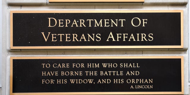 plaque on front of VA building in DC