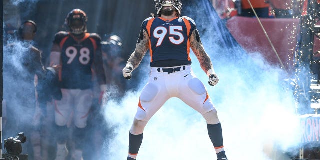 Derek Wolfe, #95 of the Denver Broncos, runs onto the field during defensive player introductions before a game against the Tennessee Titans at Empower Field at Mile High on October 13, 2019 in Denver, Colorado. 