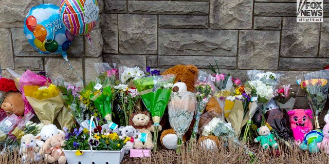 Memorials for the six victims who were killed in a mass shooting are placed outside of The Covenant School in Nashville, Tennessee on Tuesday, March 28, 2023. On Monday, three adults and three children were killed inside the school.