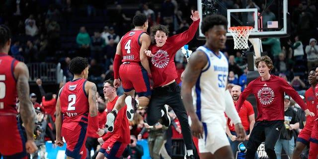 Florida Atlantic players celebrate their 66-65 win against the Memphis Tigers after a first-round college basketball game in the NCAA Tournament Friday, March 17, 2023, in Columbus, Ohio.
