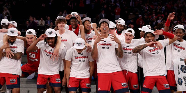 The Florida Atlantic Owls celebrate after defeating the Kansas State Wildcats in the Elite Eight of the NCAA Tournament at Madison Square Garden March 25, 2023, in New York City.