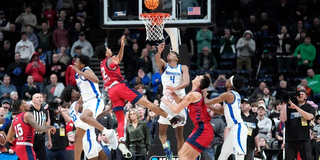 Florida Atlantic guard Nicholas Boyd (2) hits the game winning basket against the Memphis Tigers in the second half of a first-round college basketball game in the NCAA Tournament Friday, March 17, 2023, in Columbus, Ohio. Florida Atlantic won 66-65.