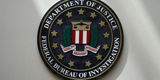 The FBI seal is pictured in Omaha, Nebraska, on Aug. 10, 2022. The number of hate crimes in the U.S. jumped again in 2021, according to FBI data released on March 13, 2023.