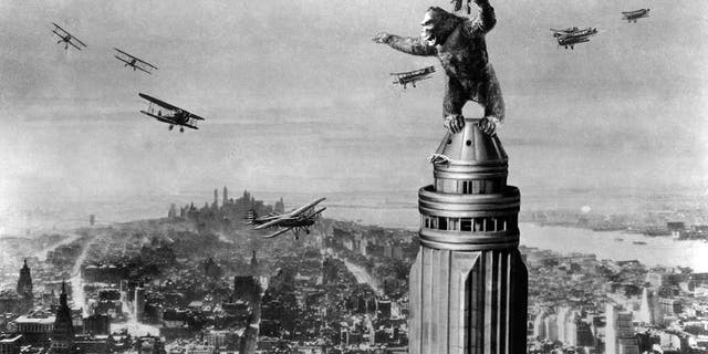 The giant ape fights off planes atop the Empire State Building in New York City at the end of the film "King Kong," 1933. 