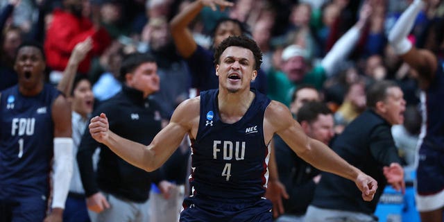 Grant Singleton, #4 of the Fairleigh Dickinson Knights, reacts to making a play against the Purdue Boilermakers in the first round of the 2022 NCAA Men's Basketball Tournament held at Nationwide Arena on March 17, 2023 in Columbus, Ohio.  (Photo by Tyler Schank/NCAA Photos via Getty Images)