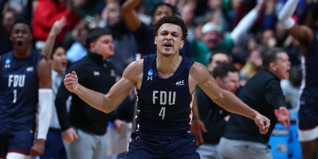 Grant Singleton, #4 of the Fairleigh Dickinson Knights, reacts to making a play against the Purdue Boilermakers during the first round of the 2022 NCAA Men's Basketball Tournament held at Nationwide Arena on March 17, 2023 in Columbus, Ohio. (Photo by Tyler Schank/NCAA Photos via Getty Images)