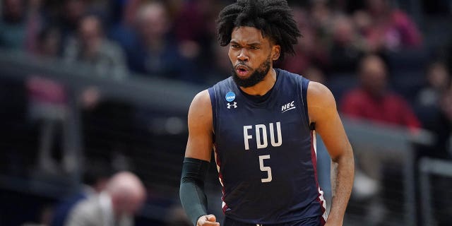 Ansley Almonor of the Fairleigh Dickinson Knights celebrates after his basket against the Texas Southern Tigers during the second half in a First Four game of the NCAA men's basketball tournament at University of Dayton Arena March 15, 2023, in Dayton, Ohio. 