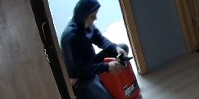 Arsonist holding gas can