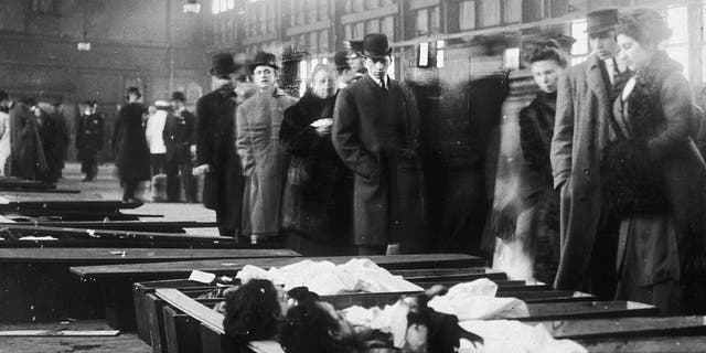Relatives and friends of the victims of the deceased Triangle Shirtwaist Company employees lined up to identify their loved ones. 