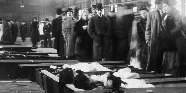 Relatives and friends of the victims of the deceased Triangle Shirtwaist Company employees lined up to identify their loved ones. 