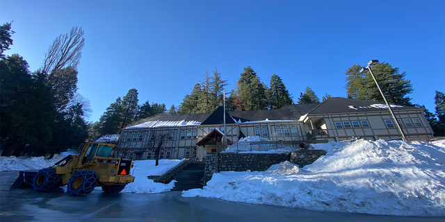 The San Bernardino County Fire Department used a fleet of eight snowcats during the worst of the storm. Fire Station No. 91 in Lake Arrowhead, CA, is still surrounded by snow drifts on March 15, 2023, three weeks since the blizzard.