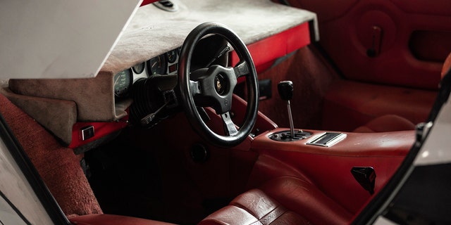 The interior shows more than four decades of wear and fading.