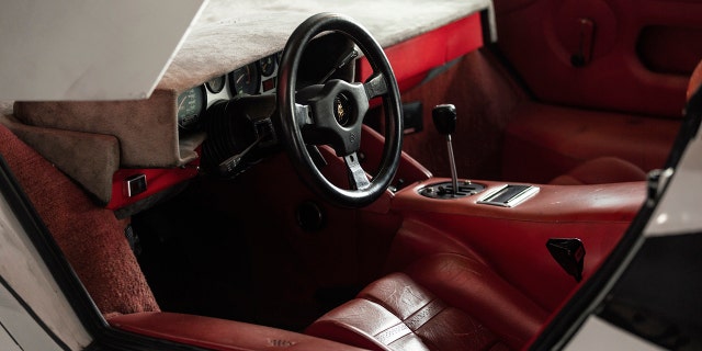 The interior shows more than four decades of wear and fading.