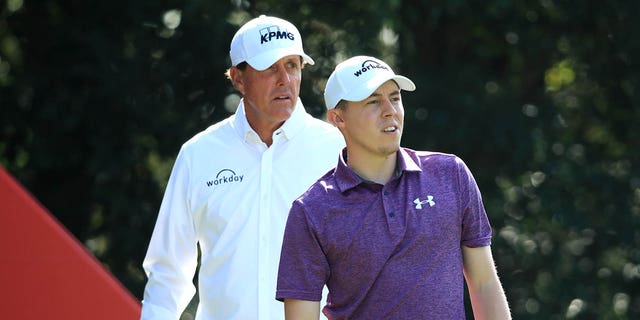 Phil Mickelson of the United States and Matt Fitzpatrick of England look down the 4th hole during Day Two of the WGC HSBC Champions at Sheshan International Golf Club on November 01, 2019 in Shanghai, China.