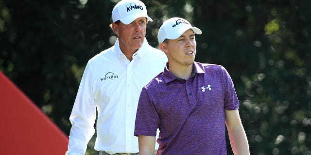 Phil Mickelson of the United States and Matt Fitzpatrick of England look down the 4th hole during Day Two of the WGC HSBC Champions at Sheshan International Golf Club on November 01, 2019 in Shanghai, China.