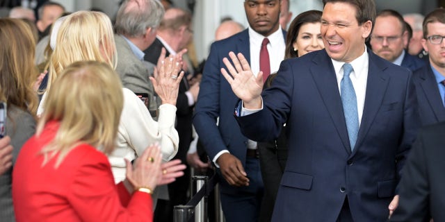 Florida Governor Ron DeSantis greets donors before speaking at the Ronald Reagan Library Sunday in Simi Valley, California.