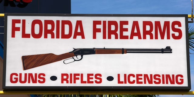 A sign for a gun shop in Miami, Florida. 