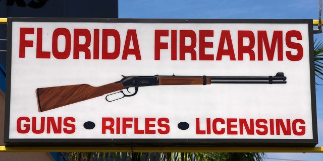 A sign for a gun shop in Miami, Florida. 