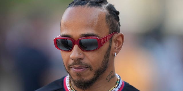 Mercedes driver Lewis Hamilton of Britain arrives for an interview in Sakhir, Bahrain, on March 2, 2023.