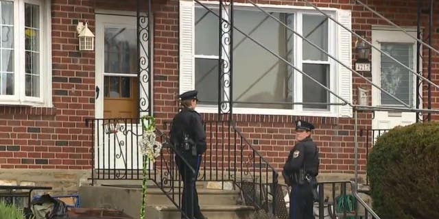façade of home where boy was found in dog cage