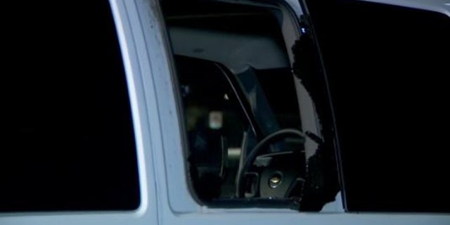 Several bullet holes and multiple windows shot out of Girl Scouts vans at a shooting in Brooklyn Center, Minnesota.