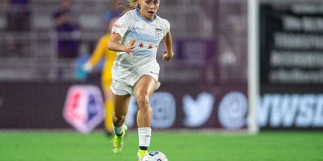 Sarah Gorden of the Chicago Red Stars dribbles the ball during a game against the Orlando Pride at Exploria Stadium on October 29, 2021 in Orlando, Florida.