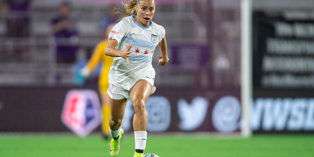 Sarah Gorden of the Chicago Red Stars dribbles the ball during a game against the Orlando Pride at Exploria Stadium on October 29, 2021 in Orlando, Florida.