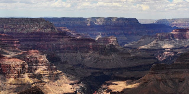 The Colorado River runs through the south rim of the Grand Canyon seen from the Hopi Point on July 5, 2022, in Grand Canyon Village, Arizona.