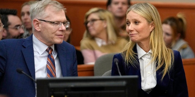 Gwyneth Paltrow and her attorney Steve Owens smile after the reading of the verdict.