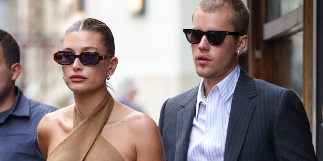 Hailey Bieber and Justin Bieber exiting a restaurant June 21, 2021, in Paris.